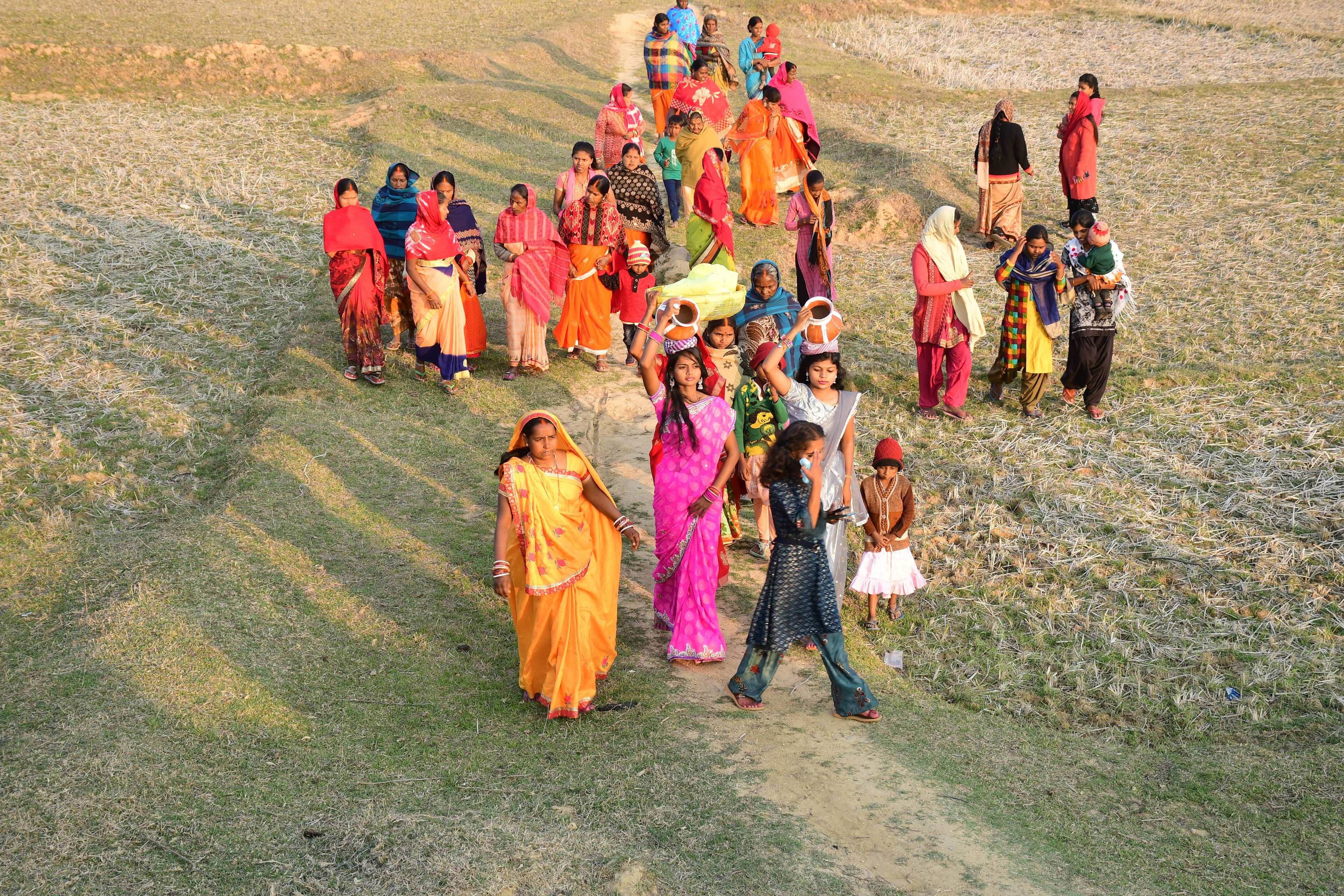 Women walking through fields